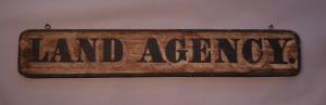 Painted Pine LAND AGENCY Sign